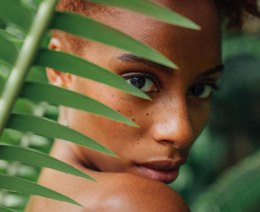 Woman in front of Leaves